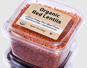 On-trend bulk essentials and ingredients - container of red lentils