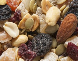 Cascade Trail Mix - Raisins, dry roasted peanuts, chopped dates, diced papaya, diced pineapple, cranberries, raw pumpkin seeds, and raw almonds.